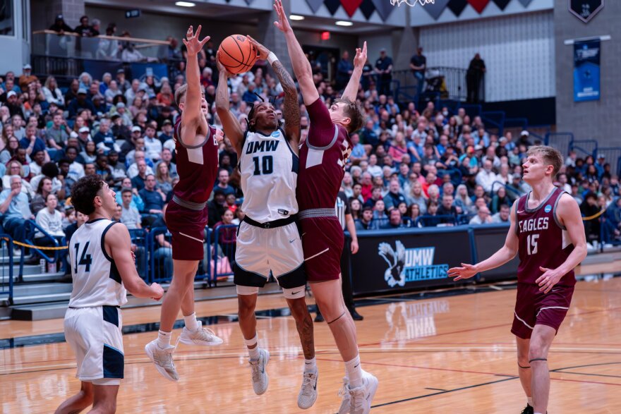 Junior guard Kaden Bates drives to the basket