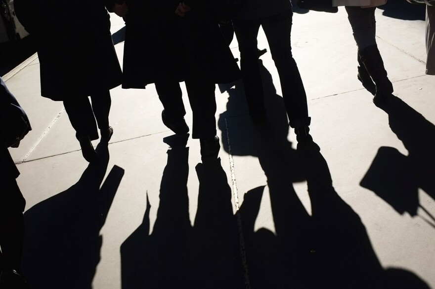 Businessmen and shoppers walk along Madison Avenue on Nov. 1, 2011 in New York City. (Spencer Platt/Getty Images)