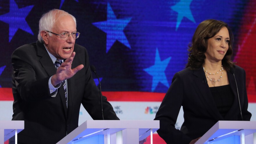 Democratic presidential candidates Sen. Bernie Sanders of Vermont and Sen. Kamala Harris of California both argued that the economy is not working well for average Americans on stage Thursday at the Democratic presidential debate.