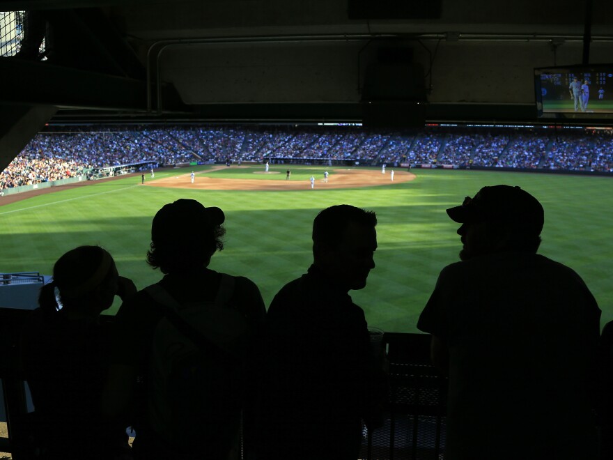 Fans take in the view of the outfield at Denver's Coors Field as the San Diego Padres face the Colorado Rockies in June.