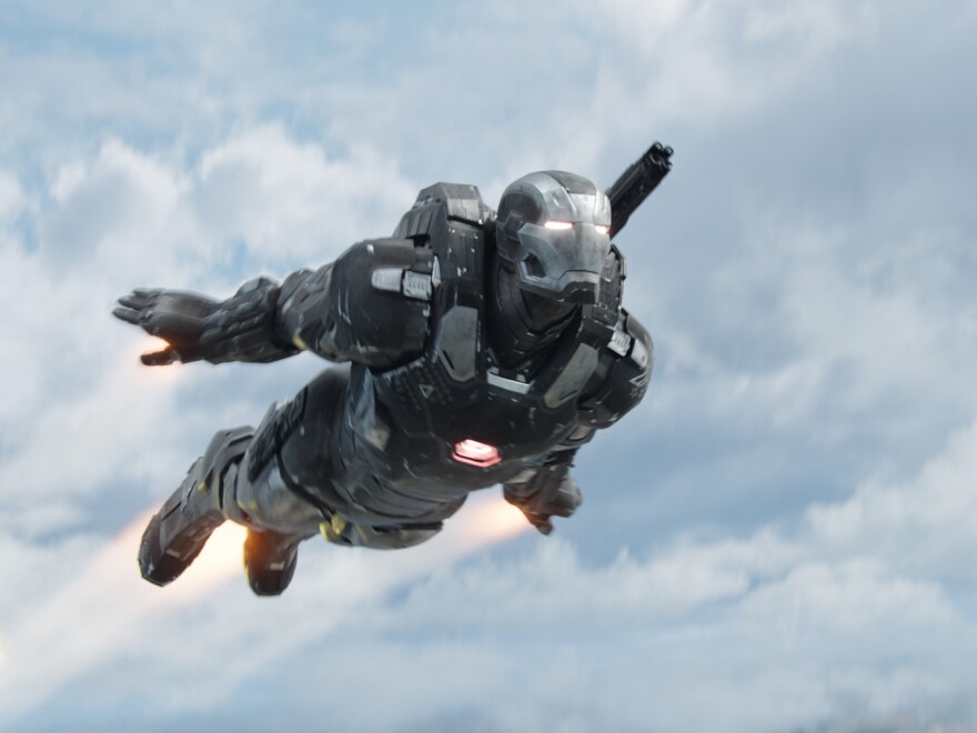 Don Cheadle in costume as War Machine in <em>Captain America: Civil War.</em>