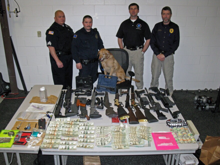 Police seized drugs, firearms, and cash as evidence. Photo courtesy of UDPS.