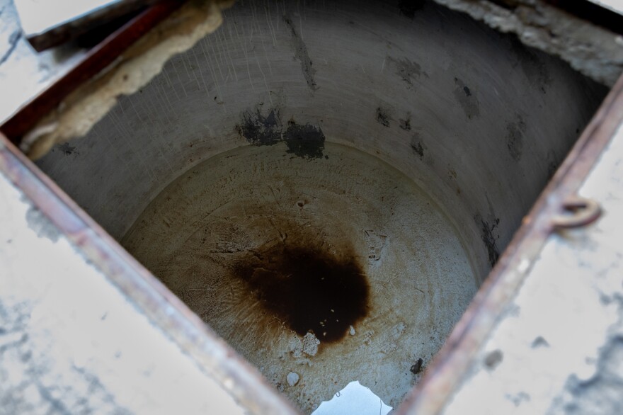 The <em>alberca</em> outside Ana Troncoso's home is nearly empty — until the next water delivery arrives. There's just enough water at the bottom to keep the cistern from cracking in the summer heat.