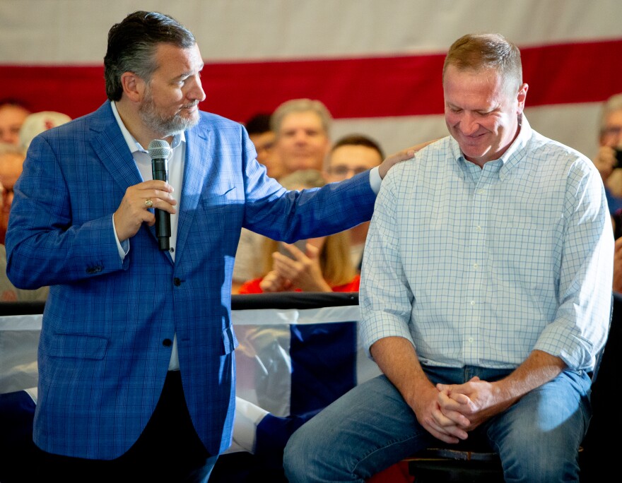 U.S. Sen. Ted Cruz, R-Texas, places his hand on the shoulder of Missouri Attorney General Eric Schmitt on Saturday, July 23, 2022, during a rally for Schmitt's Senate campaign at Piazza Messina in Cottleville. “If you're really a conservative, you will bear the stripes. You will bear the scars, because you have been in the fight,” Cruz said. “I'm supporting Eric Schmitt, because he has been standing up and fighting for the men and women of Missouri over and over and over again.”