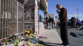 Kenny Loo, 71, prays outside Star Ballroom Dance Studio for the victims killed in Saturday's shooting in Monterey Park, Calif., Monday, Jan. 23, 2023. (Jae C. Hong/AP)
