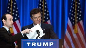 Trump campaign chairman Paul Manafort checks the podium before Republican Presidential candidate Donald Trump speaks during an event at Trump SoHo Hotel, June 22, 2016 in New York. (Drew Angerer/Getty Images)