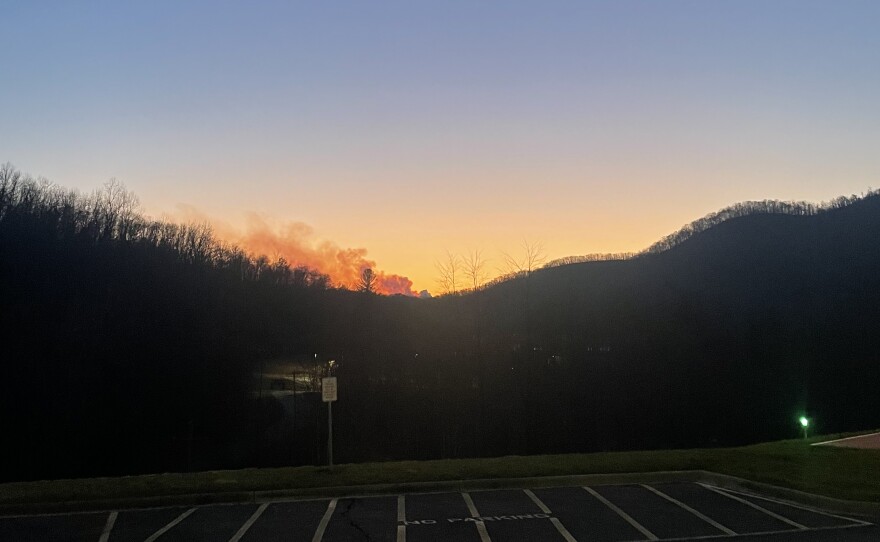 Smoke billowed from Swain County around 8 p.m. on the horizon from the Harris Regional Hospital parking lot.