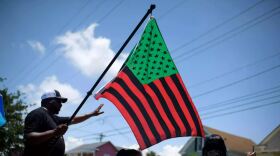 People celebrate during a Juneteenth parade in Galveston, Texas.