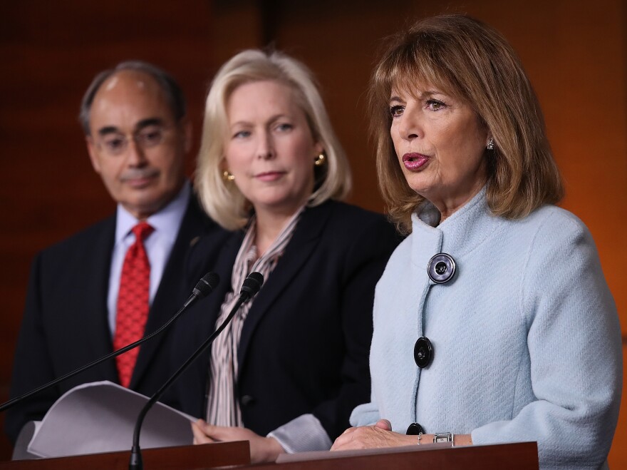 Rep. Jackie Speier, D-Calif. (right), Sen. Kirsten Gillibrand, D-N.Y., and Rep. Bruce Poliquin, D-Maine, speak at a press conference on sexual harassment in Congress on Wednesday in Washington, D.C.