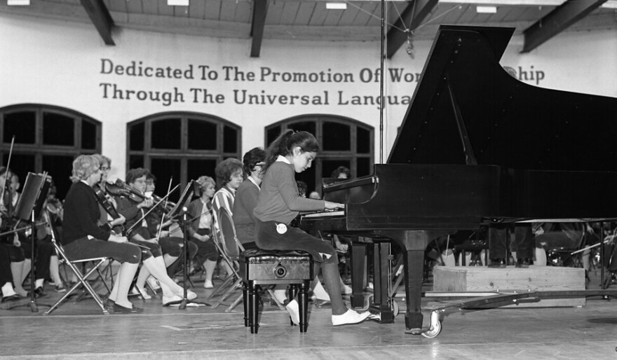 Pianist Cynthia Raim rehearses on the stage of Kresge Auditorium in 1964