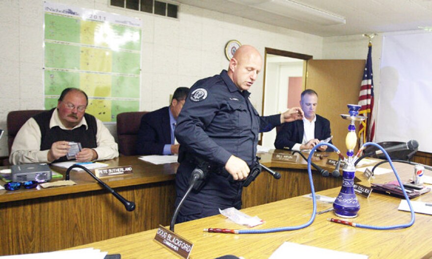 Nicholasville police officer Billy King spoke to the city commission regarding synthetic drug use and a local store selling products that can produce a high.