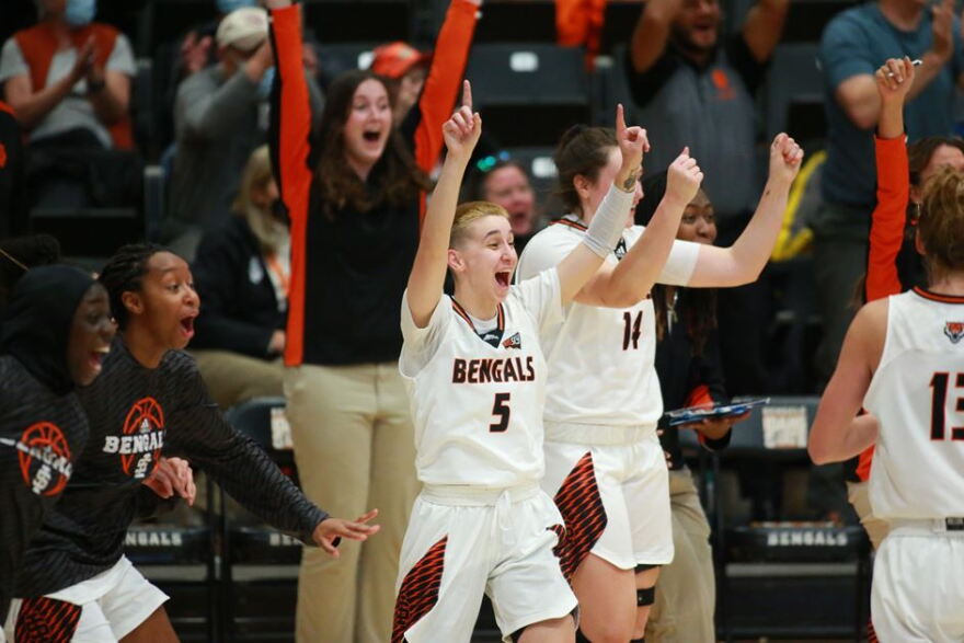 Goles (Number 5) celebrates a historic moment after scoring a career total of 1,000 points