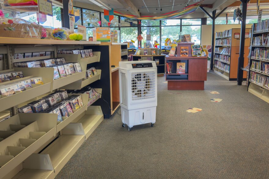 As the building struggles to keep up with the heat, the library has brought in portable air conditioners to help regulate the temperature, July 17, 2025.