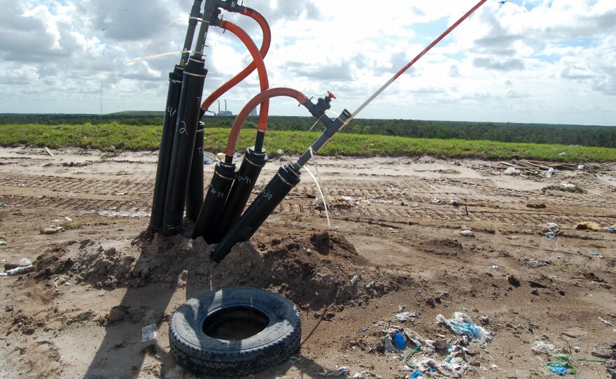Buried within the Orange County Landfill are some 500 wells, which capture methane before it is emitted to the atmosphere. The Stanton Energy Center is visible in the distance.