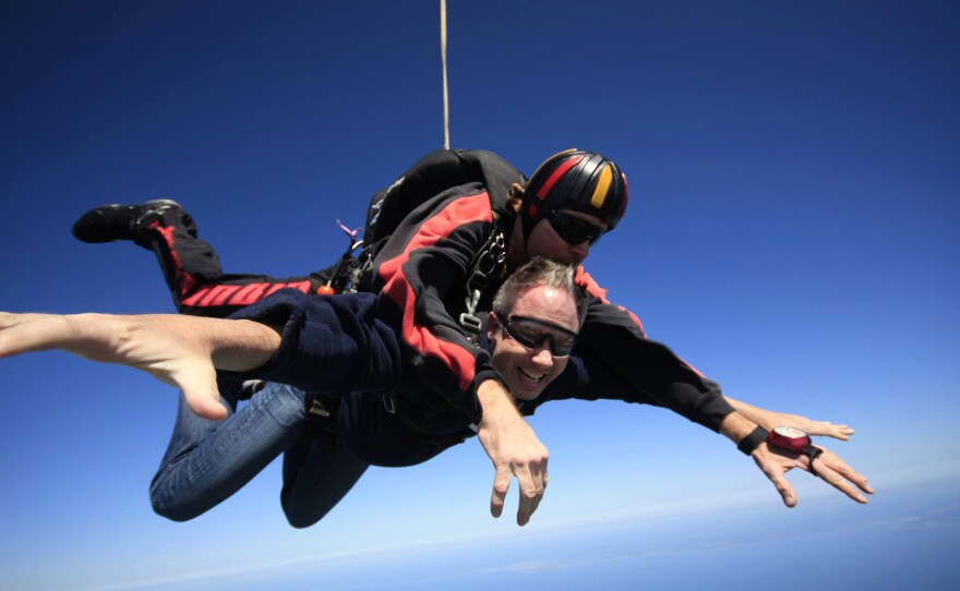 Bret Parker went skydiving in 2013 to raise money for the Michael J. Fox Foundation. Parker participated in a study earlier this year about whether a wearable tracker could effectively measure the severity of tremors caused by Parkinson's.