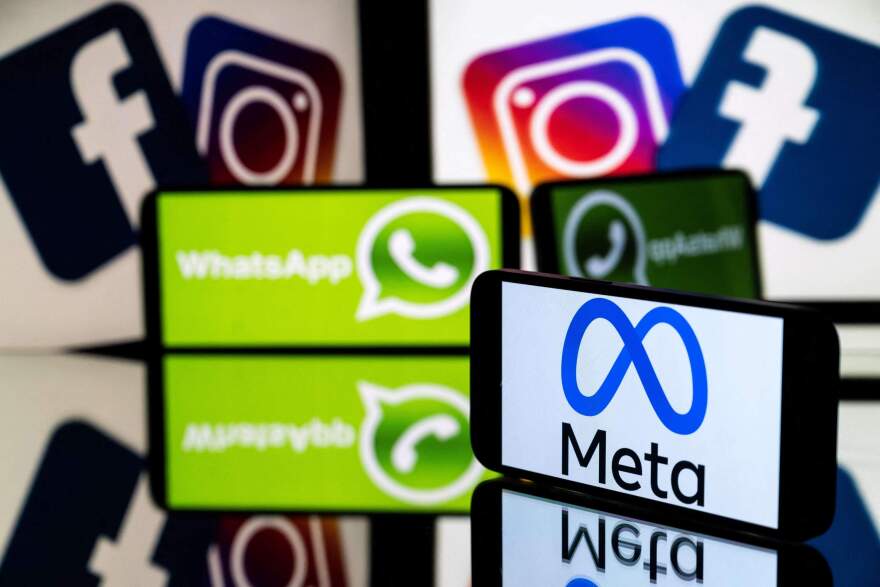 Rhe logos of the Instagram, Facebook, WhatsApp and their parent company Meta. (Lionel Bonaventure/AFP via Getty Images)