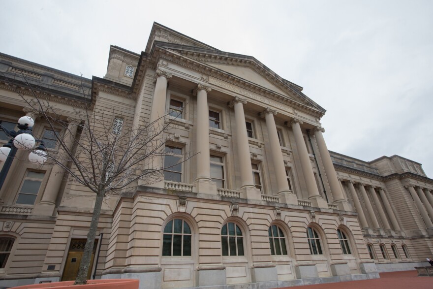 A view of the Kentucky Capitol looking up from ground level.