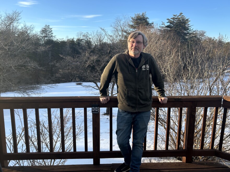 VHF Records' Bill Kellum stands on the back porch of his Albemarle County home. He relocated from Northern Virginia during the pandemic.