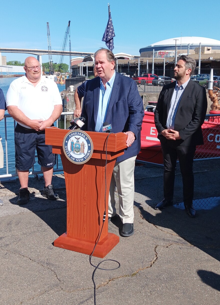 Raymond 'Skip' Wardynski speaks Monday, June 8, 2026 adjacent to the Edward M Cotter fireboat. His family business, Wardynski Meats, donated money to upgrade the vintage and still active fireboat's galley.