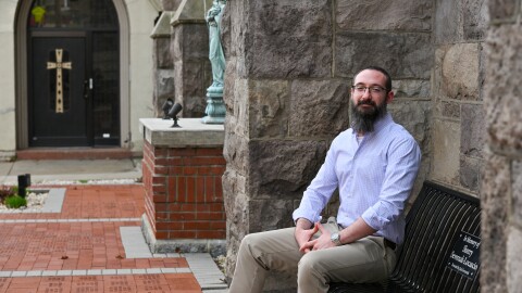 Ryan Camaratta, sitting outside St. John the Evangelist Parish in Pittston, is among one 312 people in the Diocese of Scranton expected to enter the Catholic Church this Easter. 'It's the start of the rest of my life, the rest of my journey,' said Camaratta, who was raised Catholic but 'fell away from the church' as a young man.