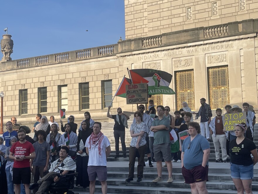 Protestors gather at the Indiana War Memorial.