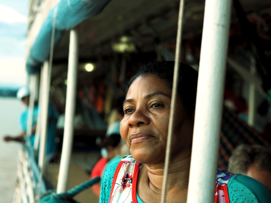 Christian missionary Mari Dalva, 50, travels the Amazon several times per year in search of people who need help along the shore and on board. Aboard the White Swan, she organizes nightly prayer circles with other evangelicals she meets.