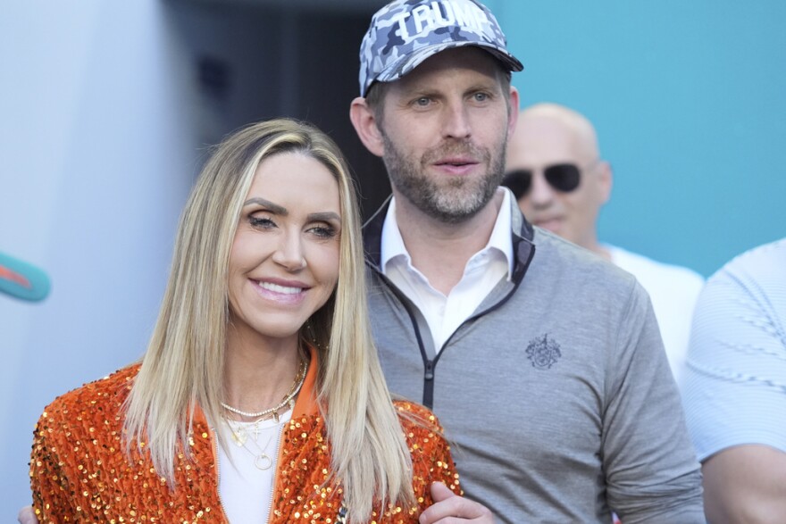 A man and a woman smiling.