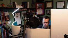 Nick Brooke, an Oklahoma City resident and data scientist, is suing the state health department over records he requested last year. Brooke is seen here working in his home office on March 18, 2021.