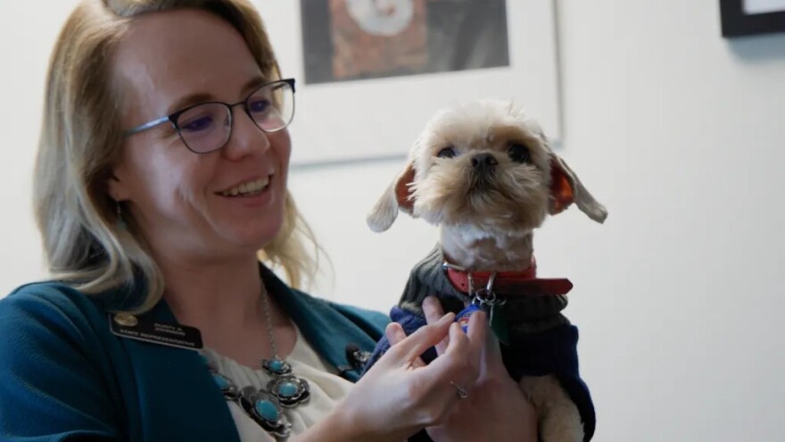 State Rep. Dusty Johnson, R-Fort Morgan, and her dog, Peaches, in Johnson’s Colorado Capitol office.