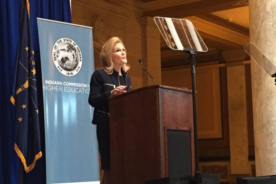 Commissioner for Higher Education Teresa Lubbers led a meeting in 2015 discussing how Indiana educators can get more college education to teach dual credit courses