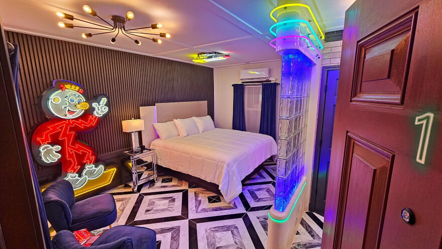 A one-of-a-kind king room at the Shamrock Court is filled with restored neon character, custom details, vintage-inspired tile and the glow of classic Route 66.