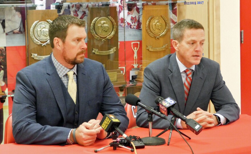 Ryan Leaf (left) and Clinton County District Attorney Andrew Wylie (right) speak to reporters before the public event