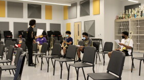 Band director Chris Herrero leads trombone practice at Edna Karr High School. Oct. 27, 2020.