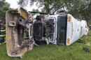 This photo provided by the Marion County Fire Rescue Dept. shows a bus carrying 53 farmworkers that crashed and overturned early Tuesday, May 14, 2024 near Ocala, Fla. which is north of Orlando. (Marion County Fire Rescue Dept. via AP)