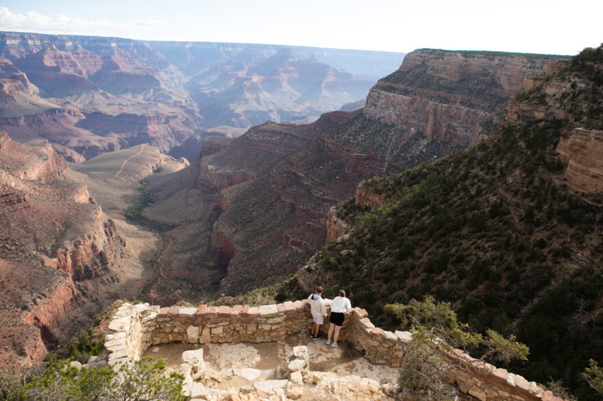 Tourists look down into the Grand Canyon off of the south rim, Monday, Aug. 31, 2026 at Grand Canyon National Park, Ariz.