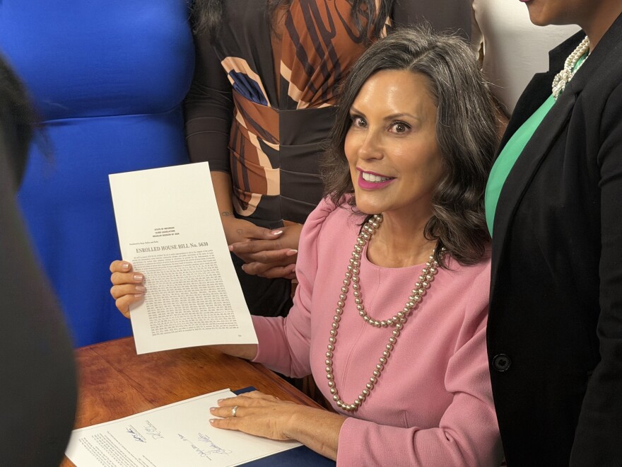 Governor Gretchen Whitmer signed the new Michigan school aid budget Tuesday surrounded by teachers, students, and legislators at a school in Southfield.