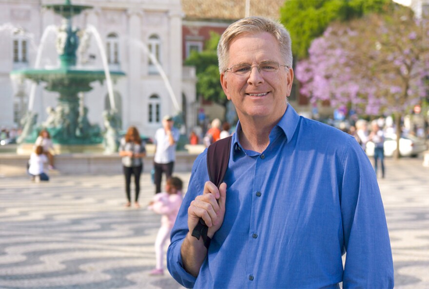 Rick Steves in Rossio square in Lisbon, Portugal.