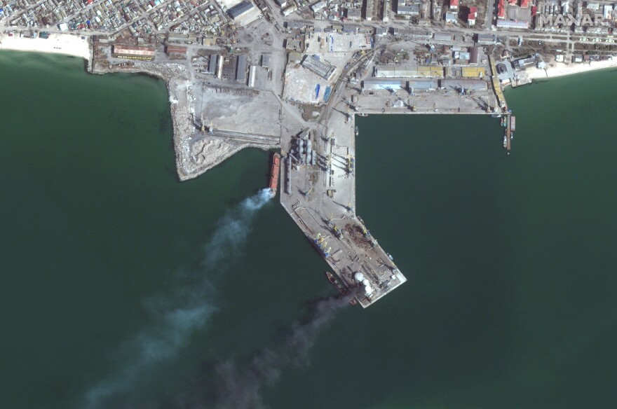 Maxar collected new satellite imagery of the southern Ukrainian port city of Berdyansk that reveals a Russian Alligator-class landing ship that is burned and partially submerged near one of the port's loading/unloading quays. Fire and smoke is also seen nearby and close to several fuel storage tanks.