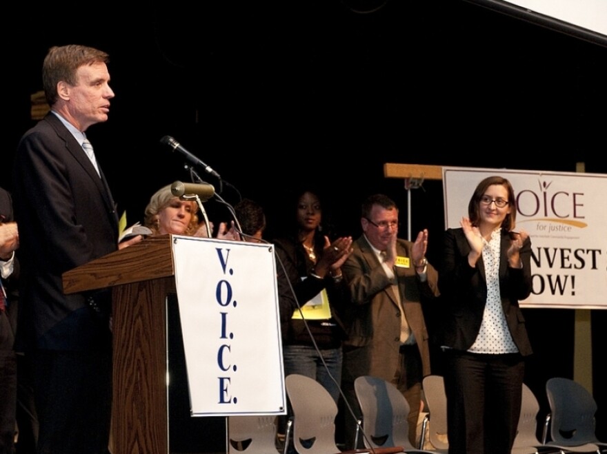 Sen. Mark Warner, D-Va., speaks at a town hall on foreclosure prevention in Woodbridge, Va., on Oct. 30.