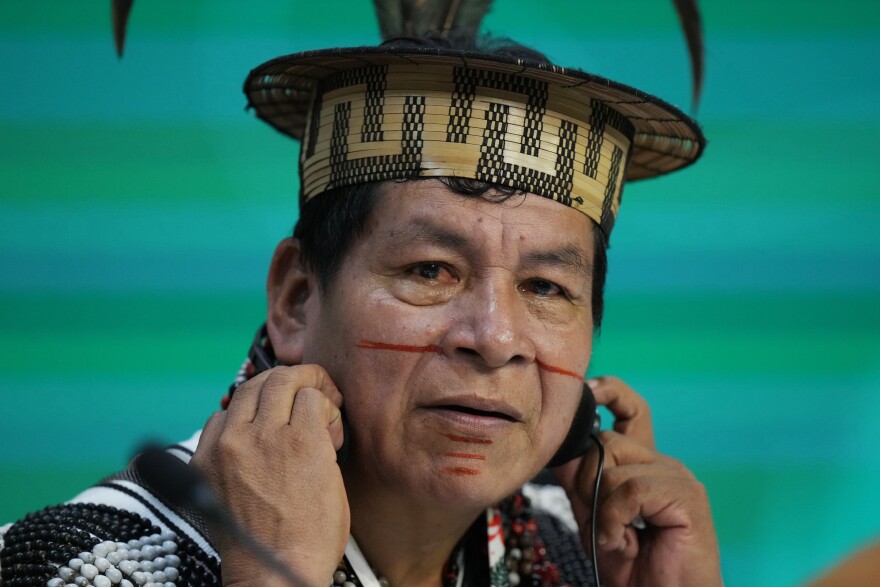 Cline Jorge Chauca Lopez listens during a session on the Indigenous strategy for fires and droughts in the Amazon during the COP30 U.N. Climate Summit, Monday, Nov. 10, 2025, in Belem, Brazil. (AP Photo/Fernando Llano)