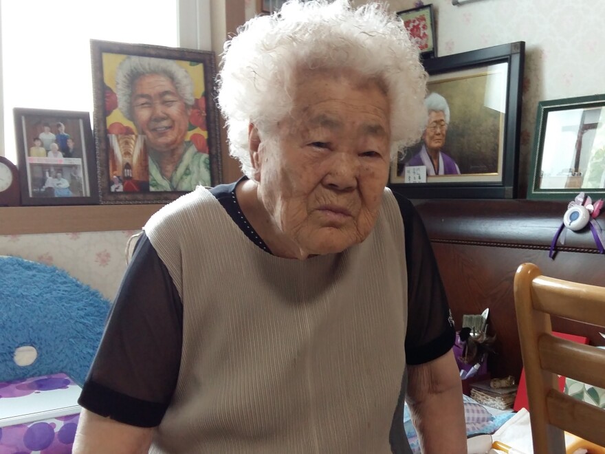 Lee Ok-seon, 90, is one of the last surviving Korean comfort women, who were forced into prostitution by Japanese occupying forces in WWII. Lee was kidnapped from her parents at age 15, and brought to work in a brothel in a Japanese-occupied region of China. Here she is pictured in her nursing home, east of Seoul.
