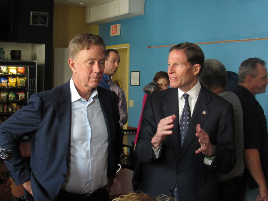Conn. Gov.-elect Ned Lamont listens to U.S. Sen. Richard Blumenthal as they visit Homes for the Brave, a Bridgeport-based nonprofit providing housing and services for veterans and others in need.