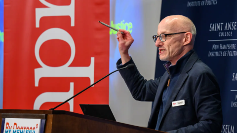 NHPR President and CEO Jim Schachter addresses the crowd at the 3rd annual By Degrees Climate Summit on Fri., May 2 at St. Anselm College in Manchester, NH.