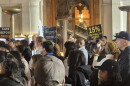 Advocates call for funding increases for the Health Homes program during a rally on Oct. 7, 2026, at the New York State Capitol.