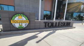 City seal and sign that reads Tolleson on concrete