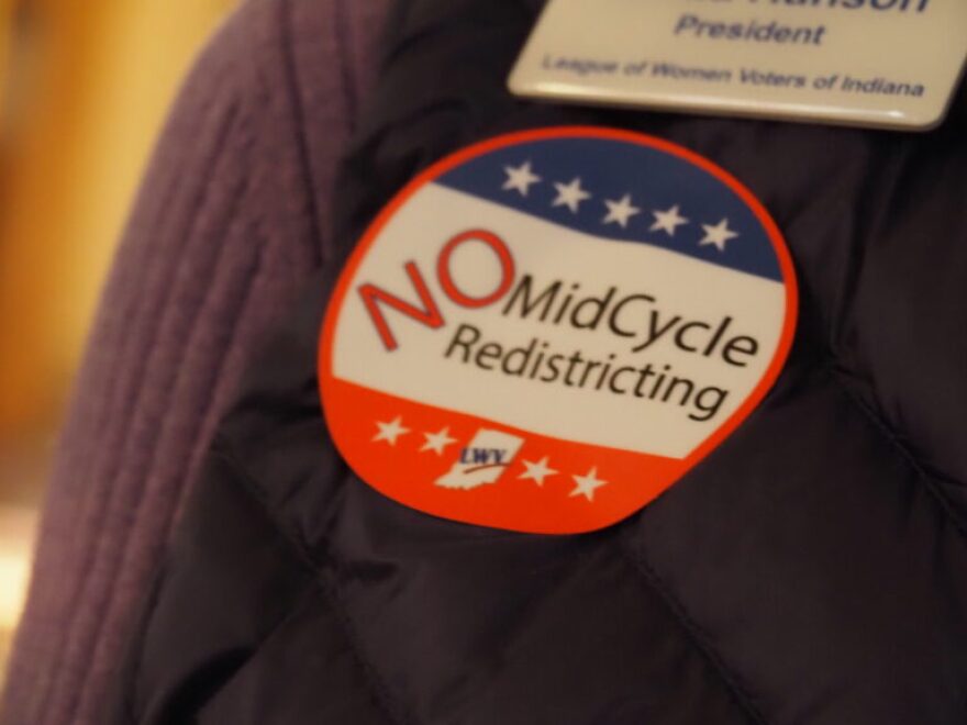 Linda Hanson, president of the League of Women Voters’ Indiana chapter, wears an anti-early redistricting sticker on Monday, Dec. 1, 2025.