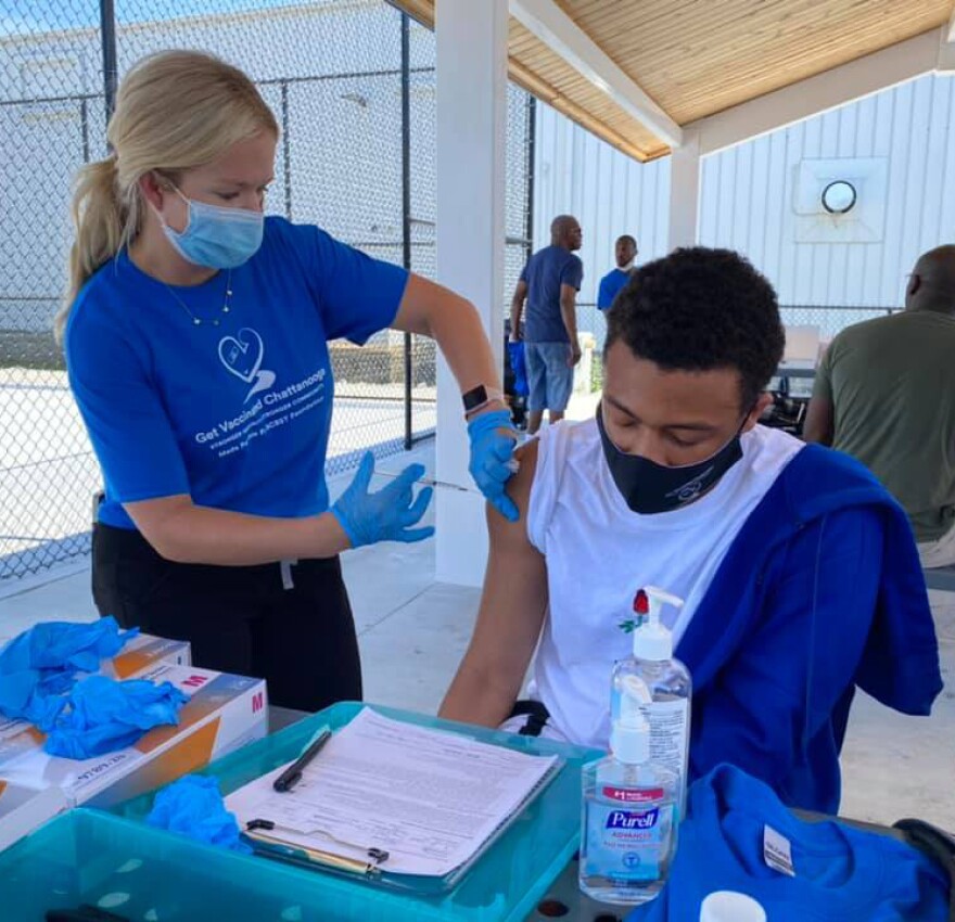 A vaccination at last month’s block party in Chattanooga’s Highland Park neighborhood.