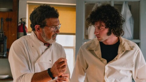 The new film Tony focuses on just a splinter of Anthony Bourdain's life — the mid-1970s summer when he was 19. Above, Antonio Banderas as Chef, and Dominic Sessa as a young Anthony Bourdain.