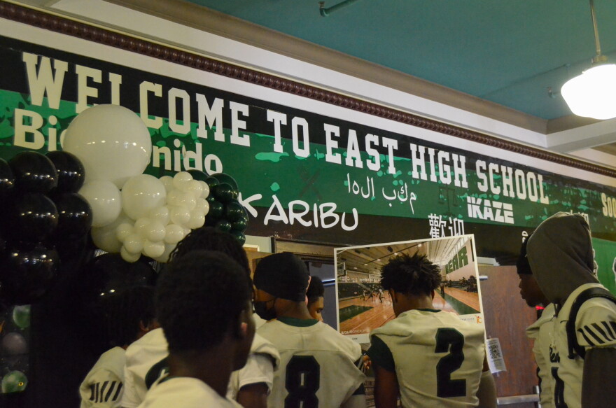 A sign at East High School includes some of the more than 40 languages represented there.