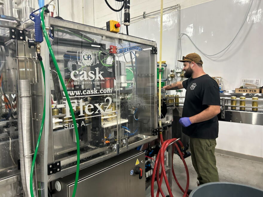 Nine Pin's cider is put in more than 2 million cans each year before it is labeled, packaged and shipped.